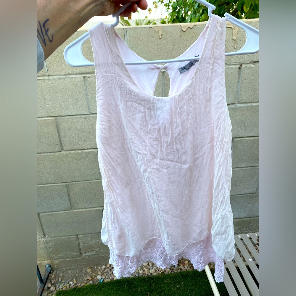Adorable super soft and flowy baby light pink tank with 2 layers .